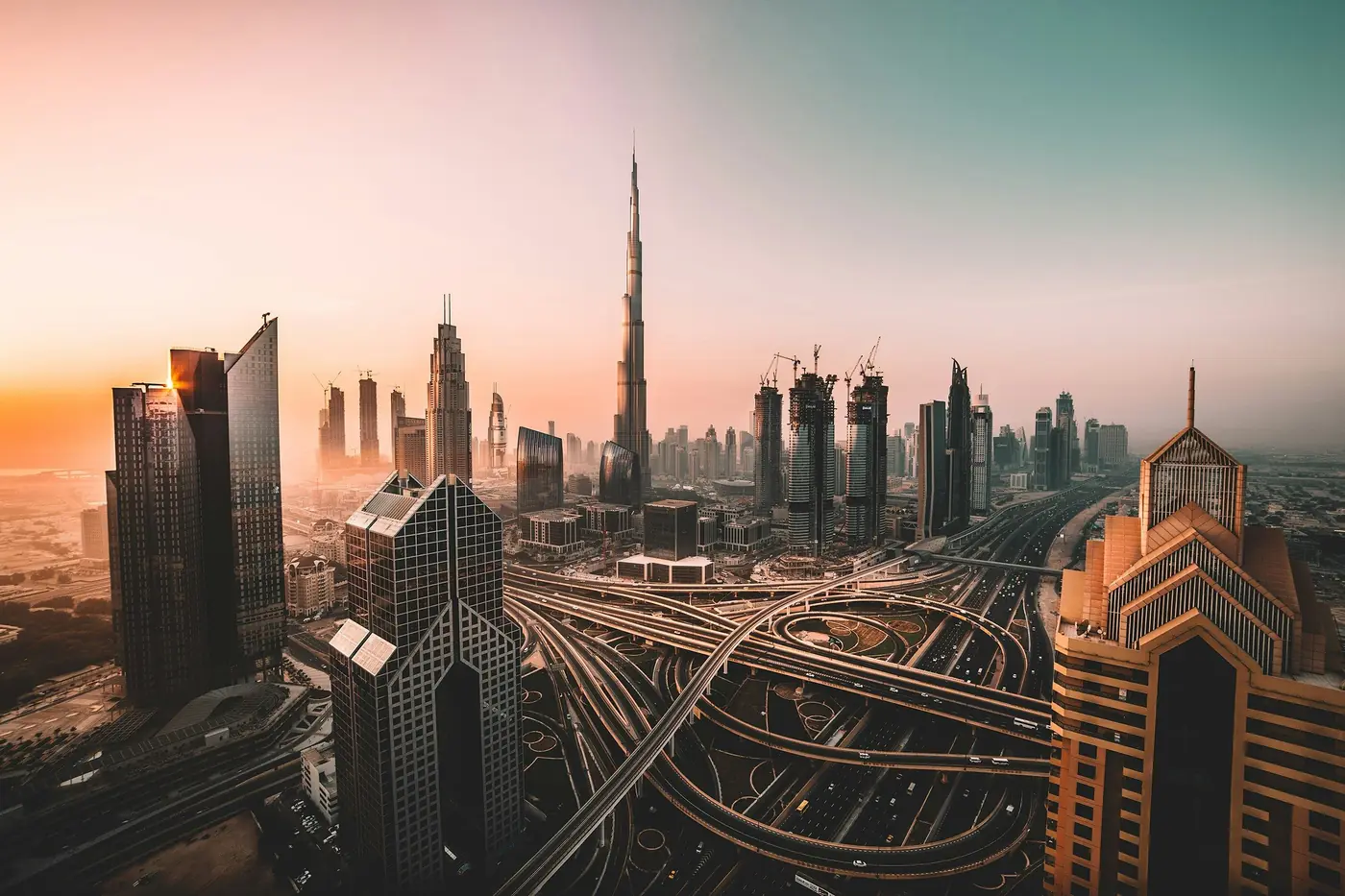 Downtown Dubai skyline at dusk with Burj Khalifa