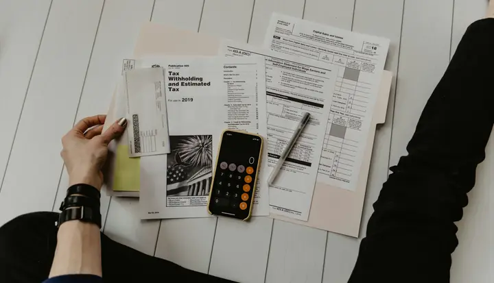Tax documents and a calculator